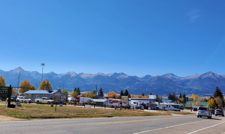 Panorama of Wet Mountains in background, Westcliffe main street businesses in foreground